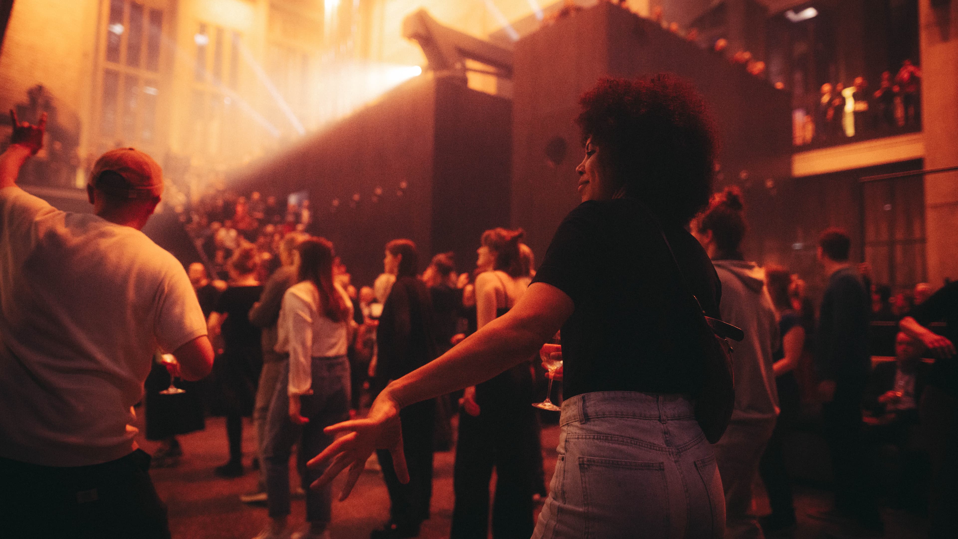 Dancers on a busy dance floor during a party in the Bergson hall.