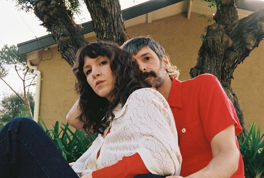 Members of the band Widowspeak posed together for a promotional portrait.