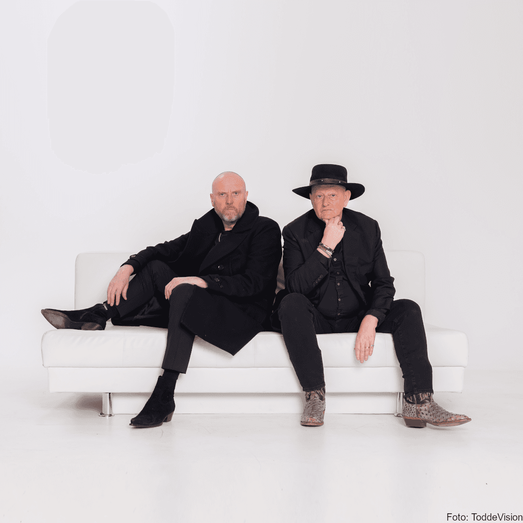 Promotional square portrait of the band Heaven 17 for their Electronically Yours tour.