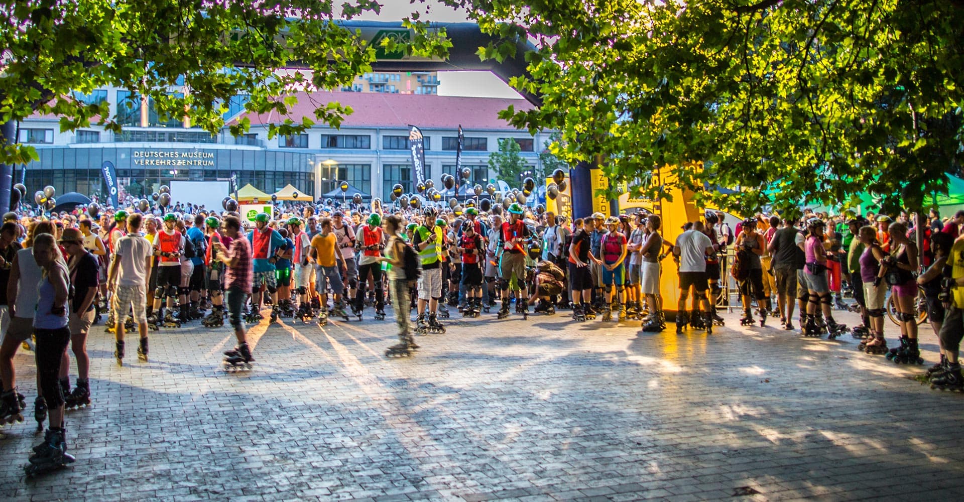 A large crowd of inline skaters gathering at the Munich Blade Night start area.