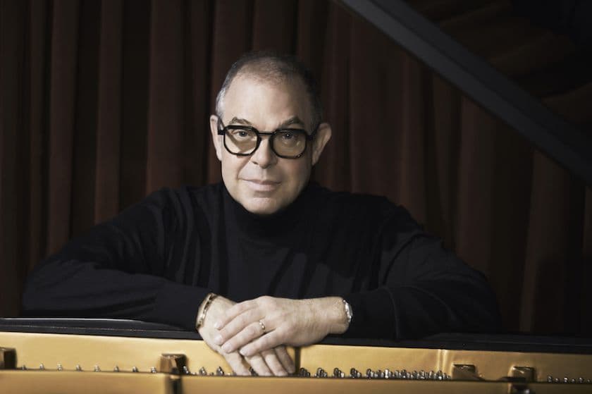 Portrait of jazz pianist Bill Charlap at the keyboard.