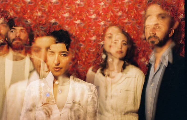 Press photo of the band Derya Yıldırım & Grup Şimşek posing together.