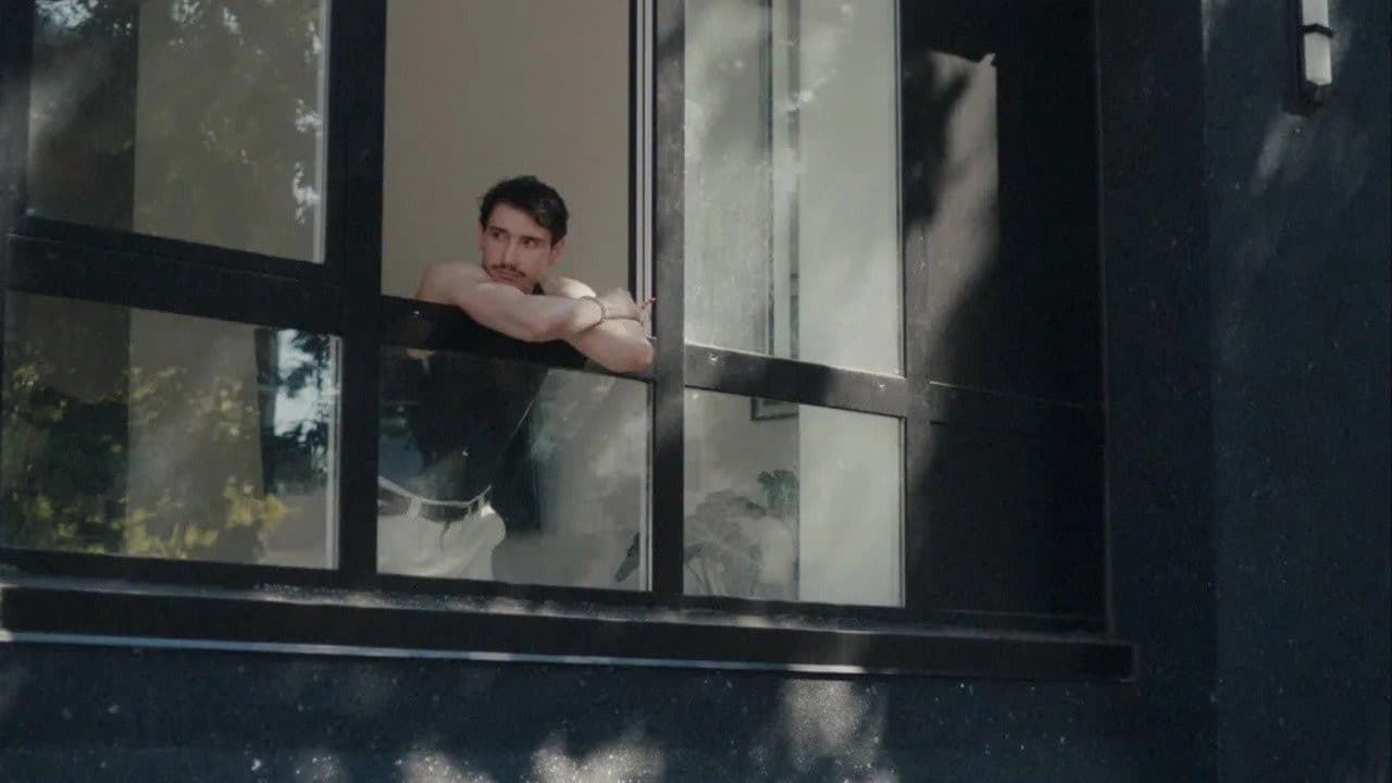 Still from Drunken Noodles showing a young man in warm summer light