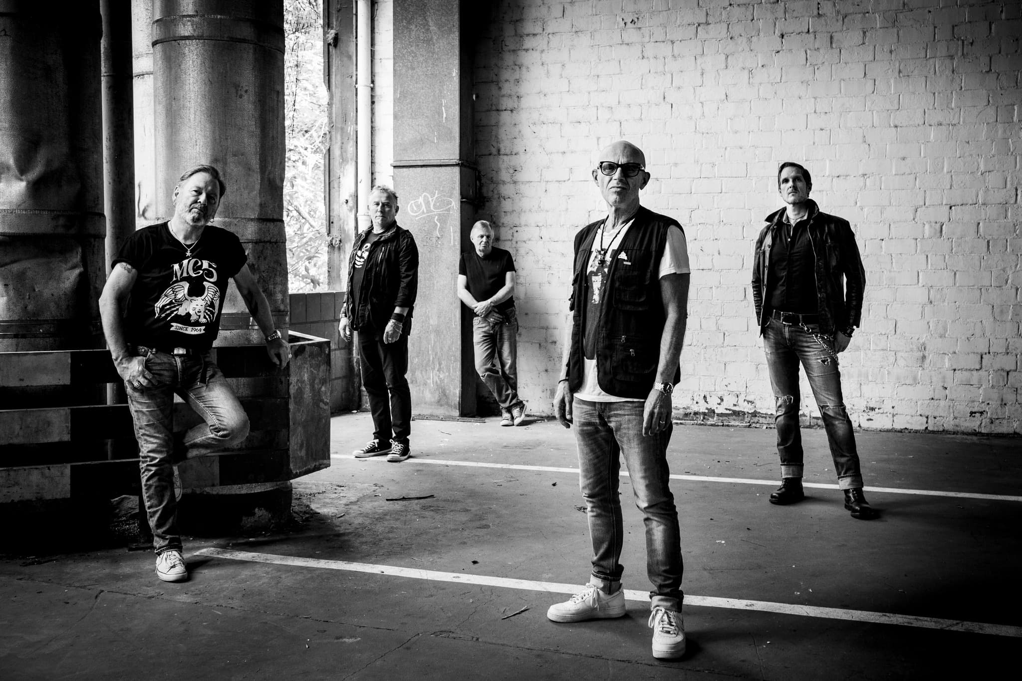 The rock band Extrabreit performing live on a concert stage.