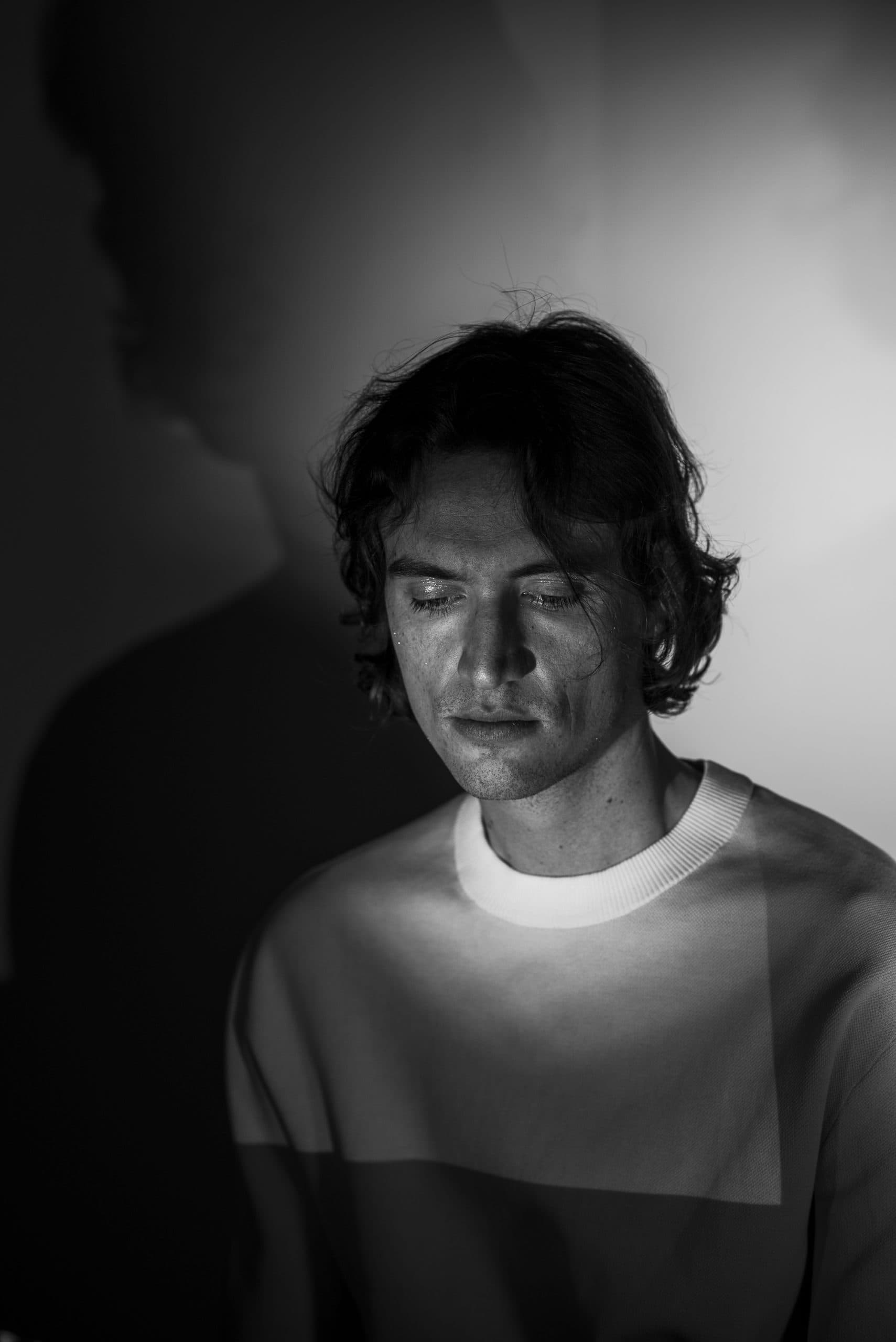 Press portrait of the musician behind Saguru, credited to Thess Riva.