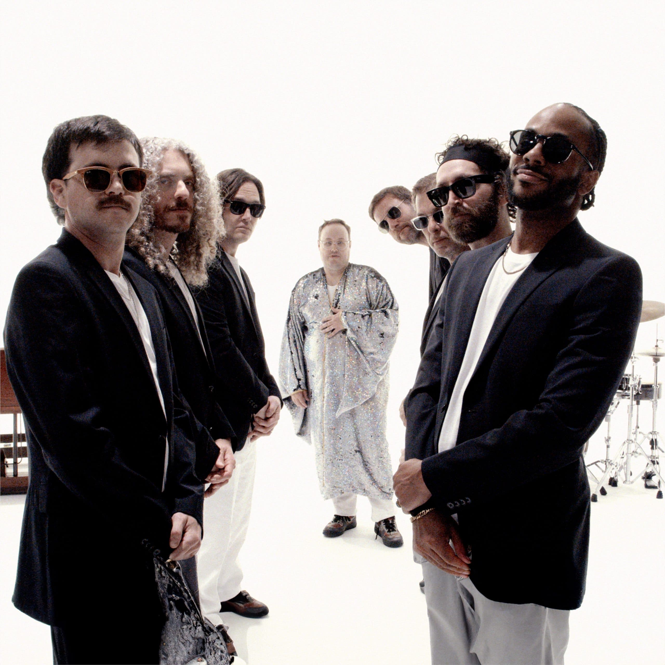 The band St. Paul & The Broken Bones photographed together in a promotional portrait.