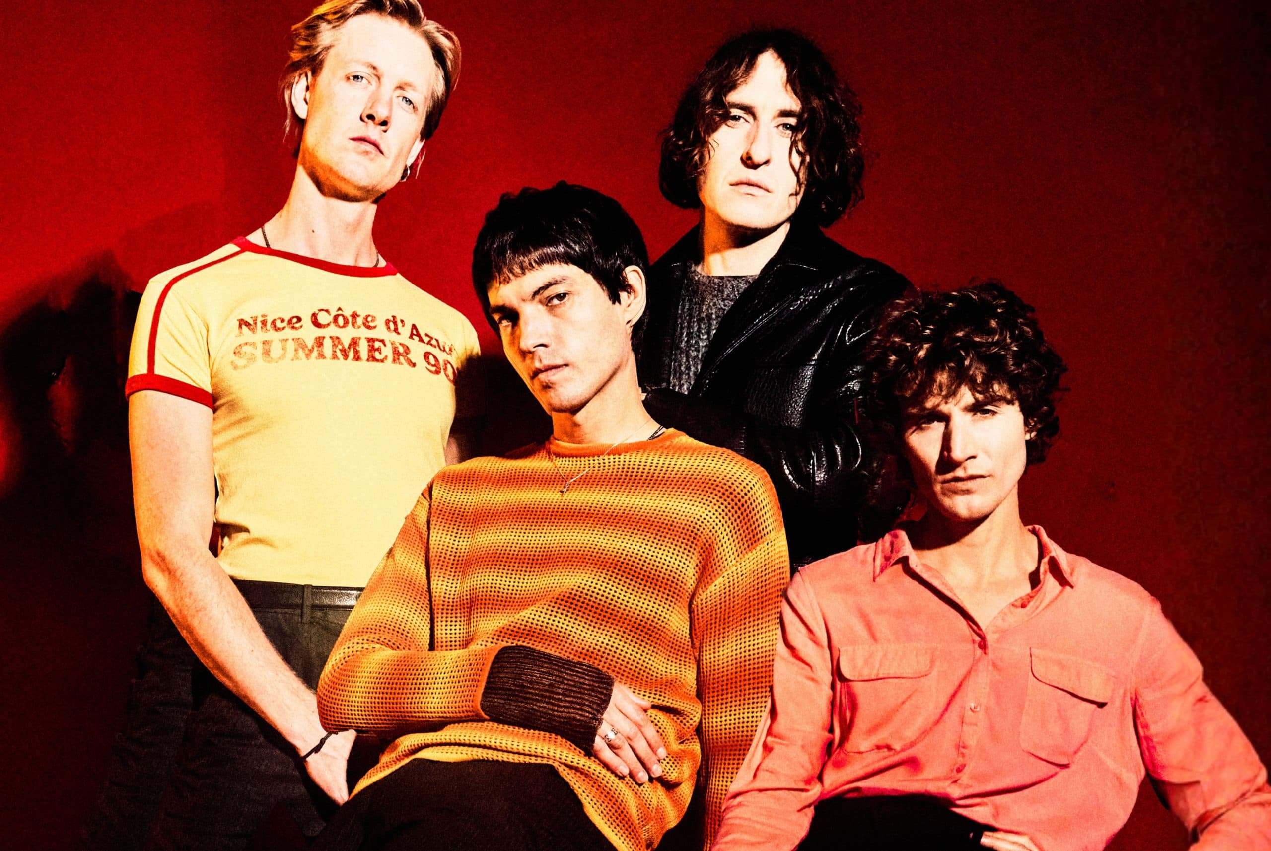 Press photo of the band Temples standing together in front of a plain backdrop.
