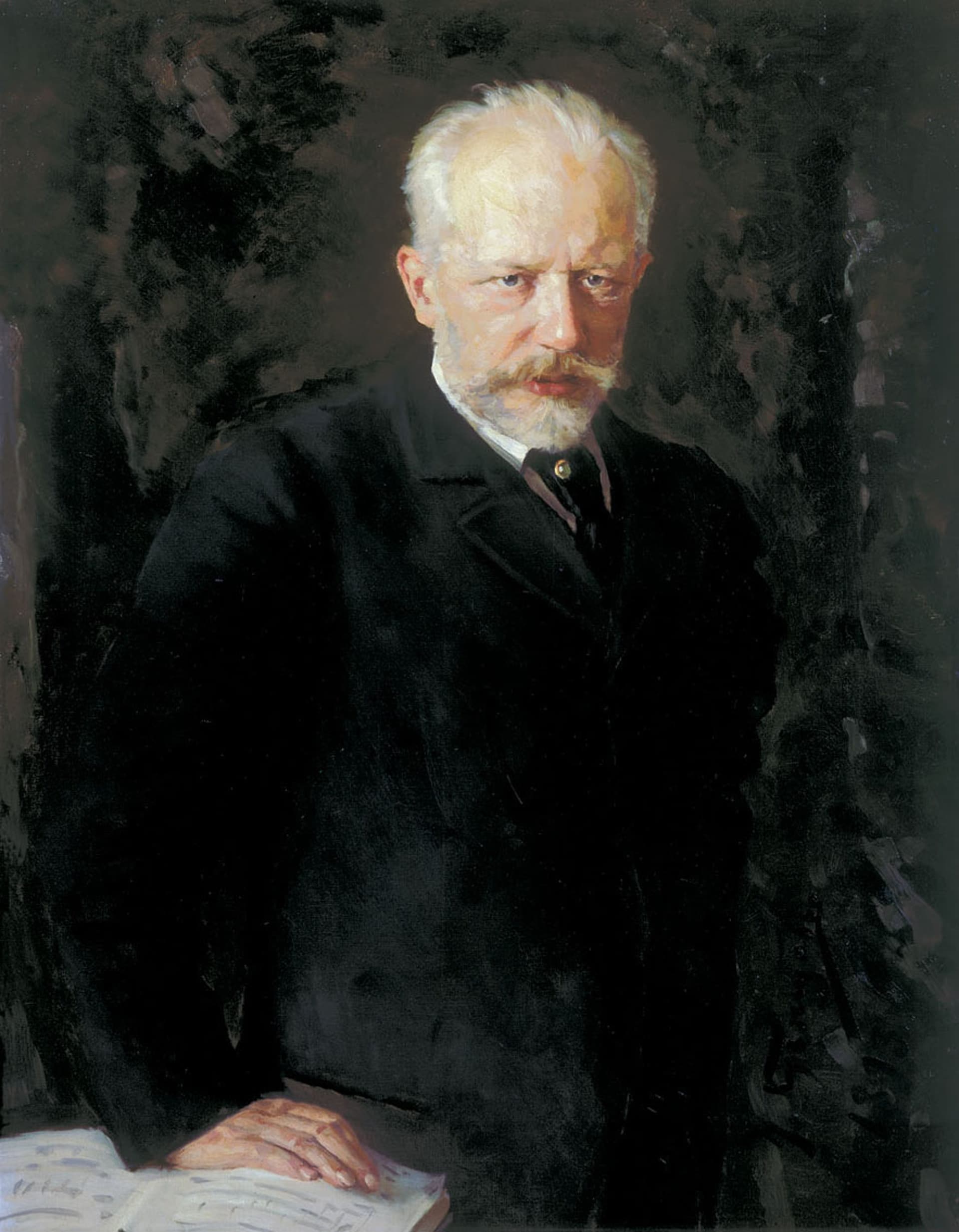 Painted portrait of composer Pyotr Ilyich Tchaikovsky in a dark suit, seated and facing forward.