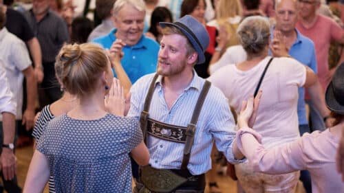 People practising Bavarian dance steps for the Kocherlball.