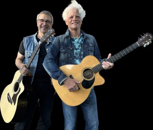 M&C Unplugged performing with acoustic guitars.