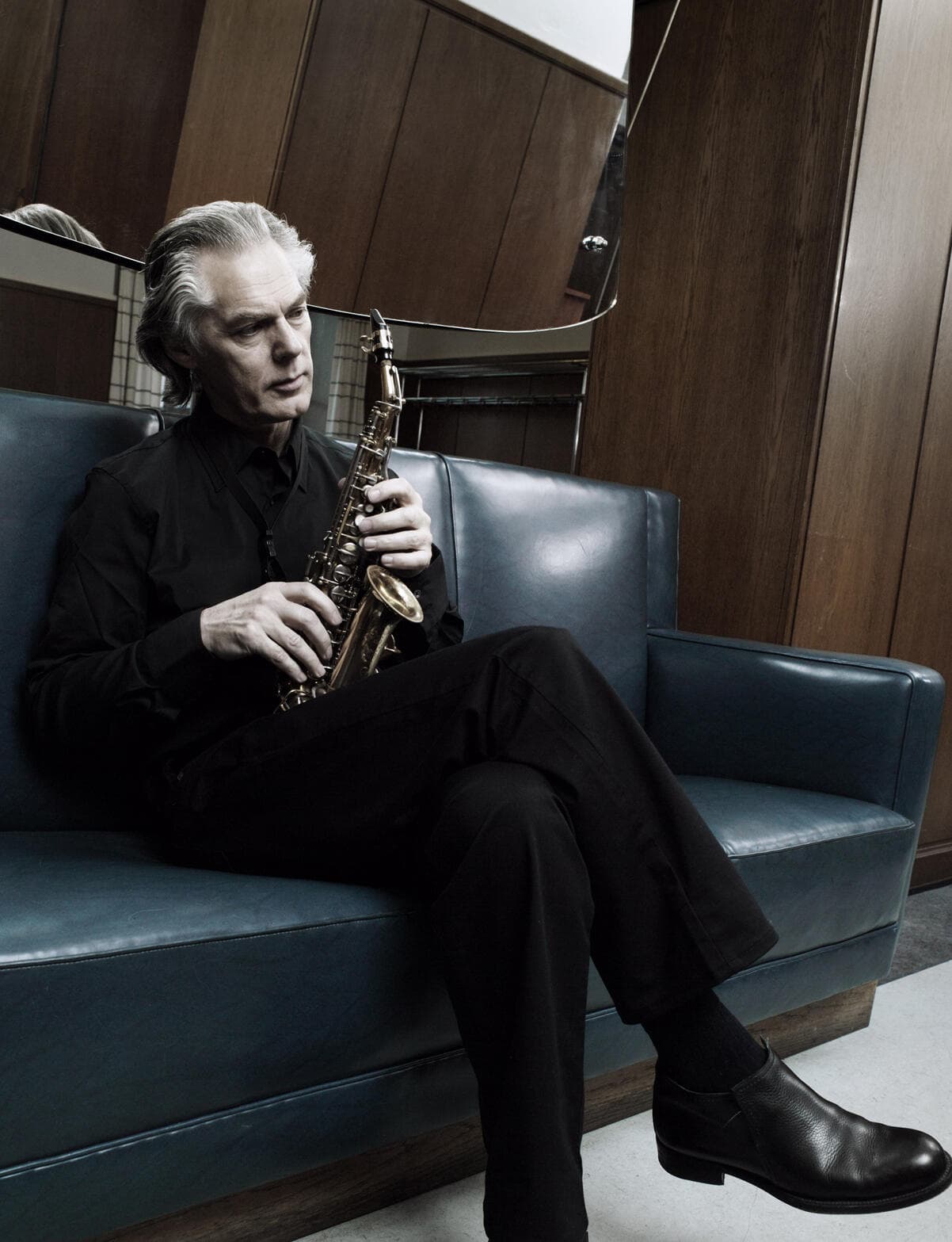 Jan Garbarek Group seated on a couch