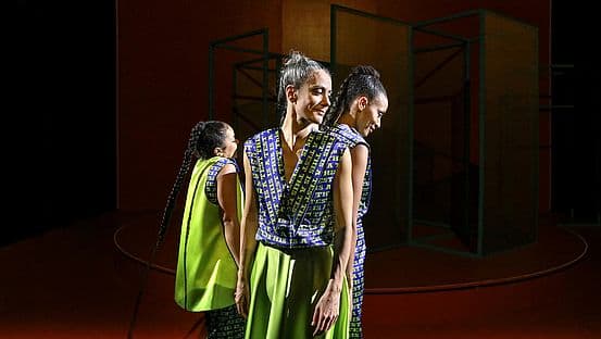 Production photo from Rezitativ at the Marstall, showing performers on a darkened stage.